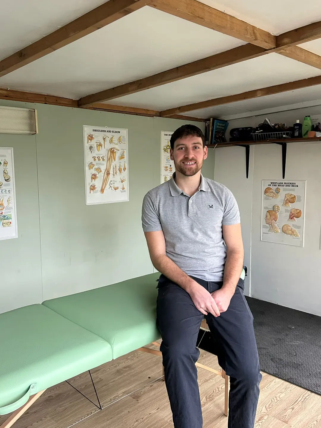 Adam Sindall-White in his physiotherapy clinic in Street